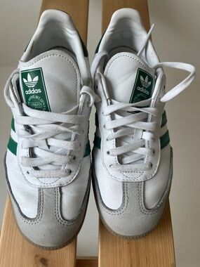 Adidas woman’s White Sneakers with Green Three-Stripes